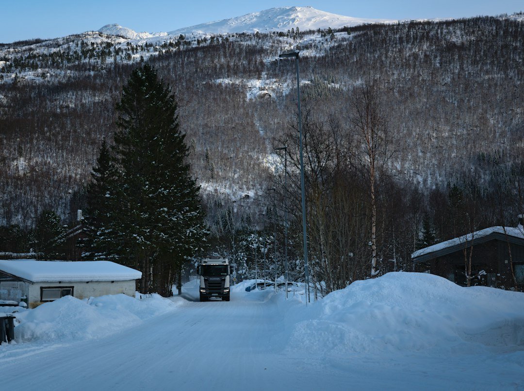 Heated driveway and snow-covered luxury mountain home at high elevation in Park City, Utah